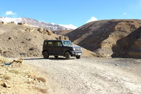 A 4x4 on a gravel road in Spiti