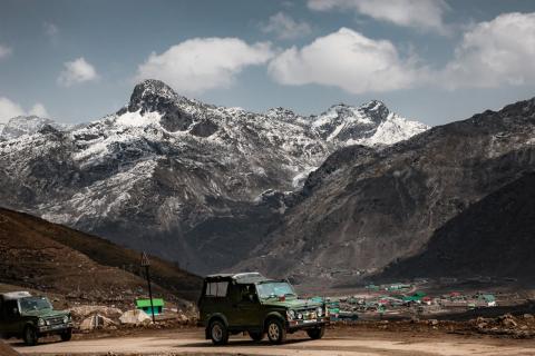 Jeeps at a high Himalayan road stop