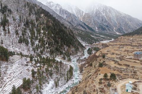 A snowy river valley in Spiti